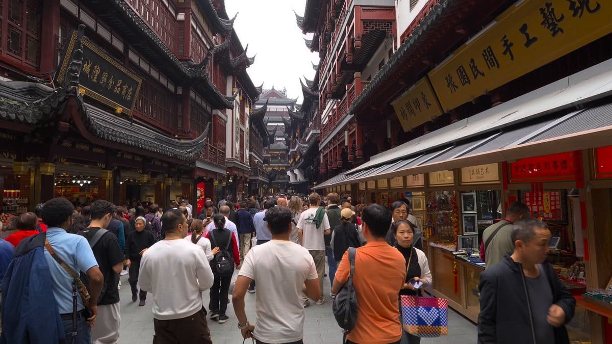 A bazaar lane with gilded shop boards down