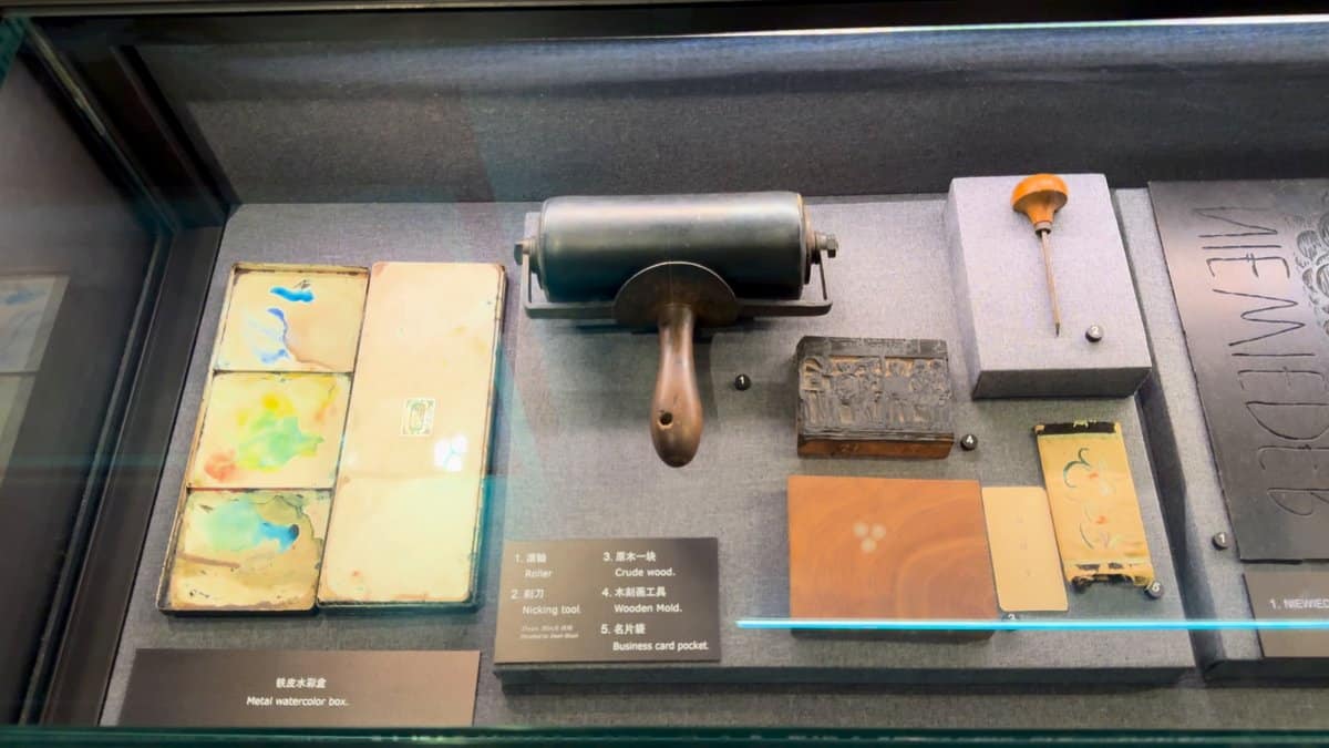 A case containing a hand printing roller, bound