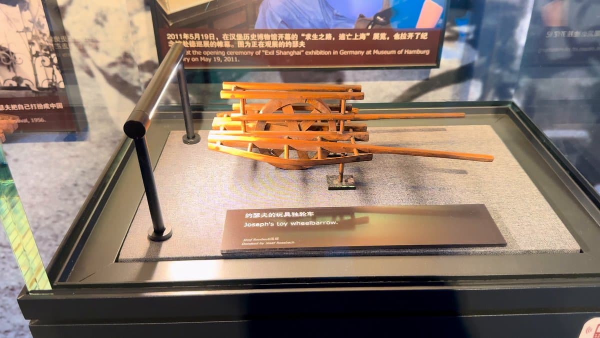 A case of wooden objects with a caption