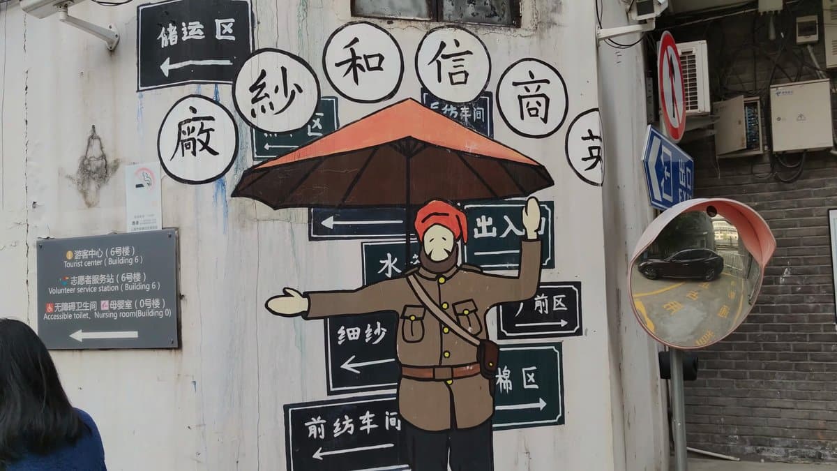 A cluster of black and white signboards on