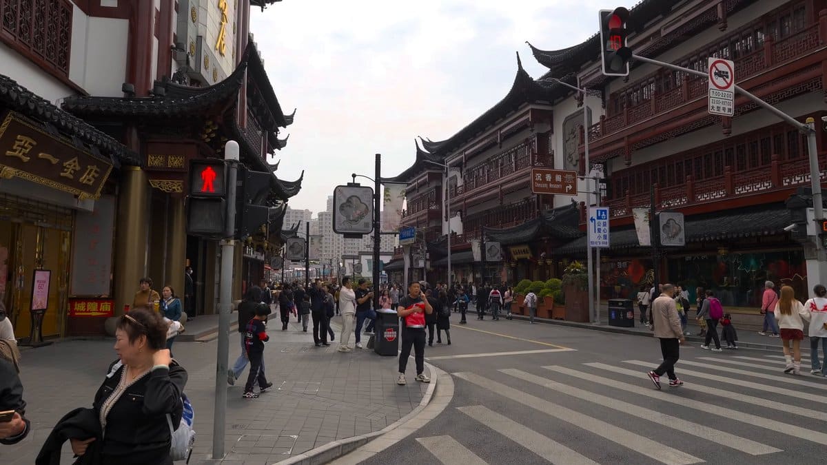 A crossing outside the bazaar — traditional-style buildings,