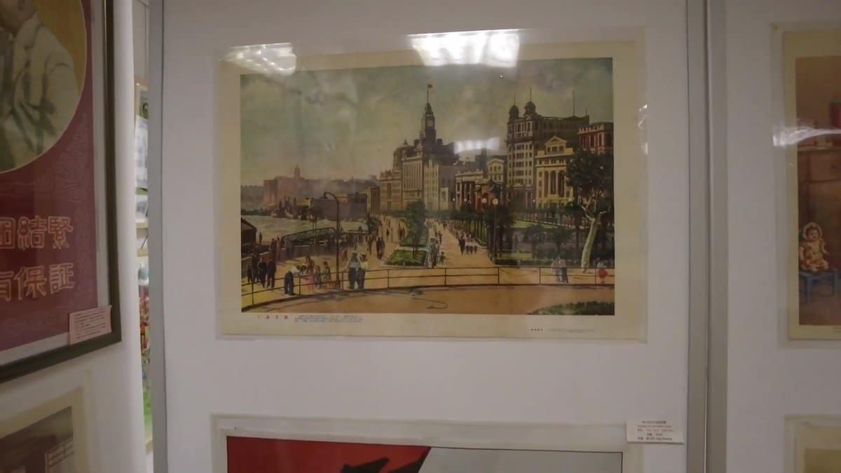 A framed painting of the Bund — the