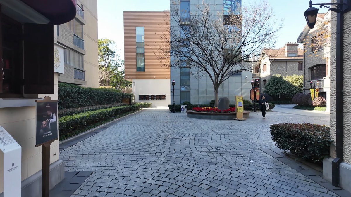 A lane where a modern block meets the