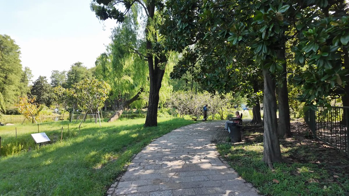 A path across the grass with an information