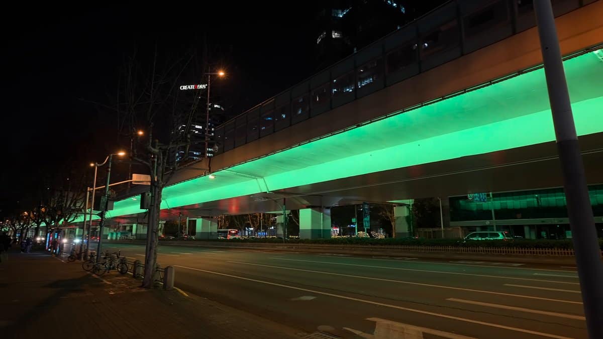 A street outside the compound, a long green