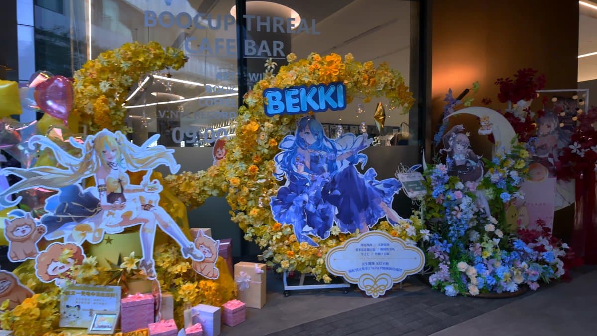 A yellow and blue flower arch around a