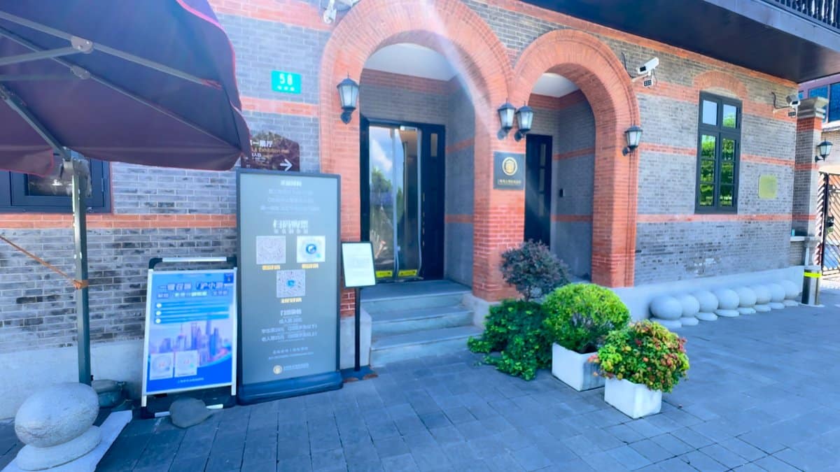 Arched brick entrance with planters
