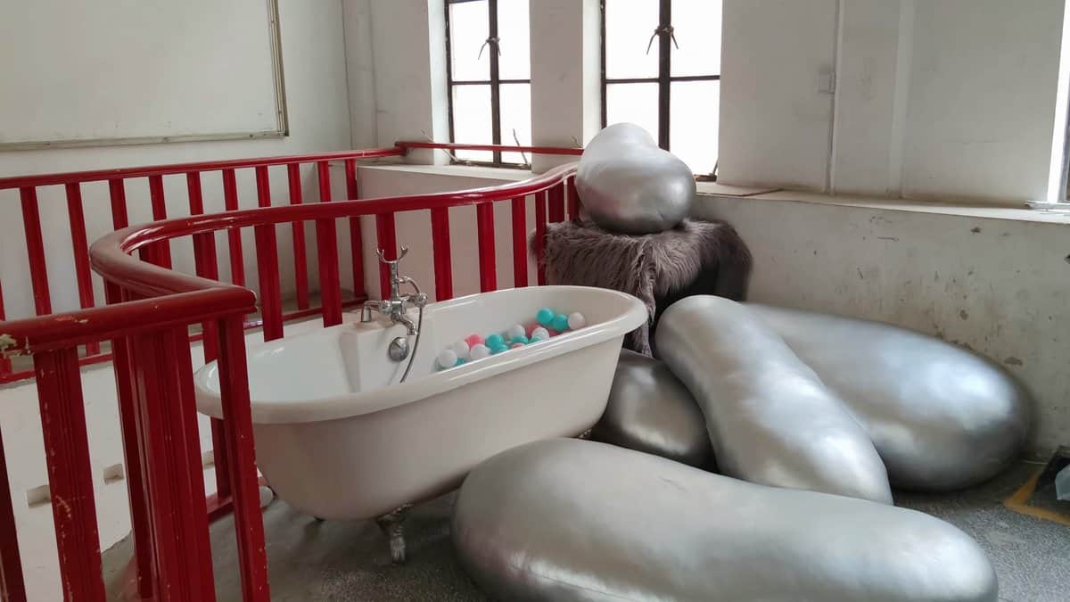 Bathtub installation in red-railed frame