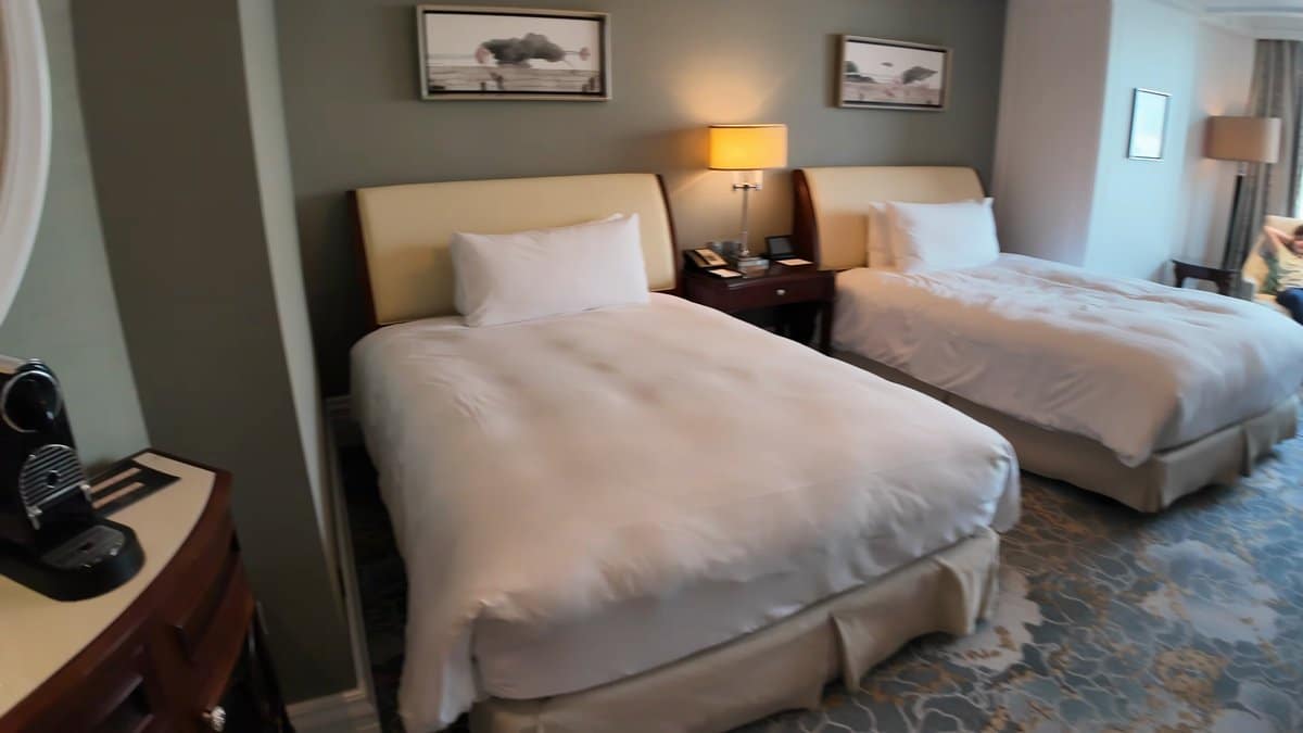 Bedroom with cream sleigh beds