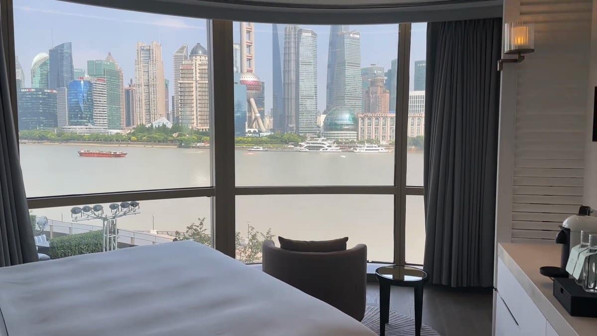 Bedroom with curtains drawn back