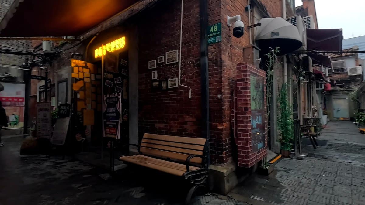 Bench beneath framed wall pictures