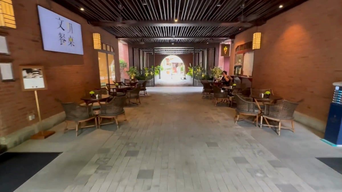 Cafe tables in the brick arcade