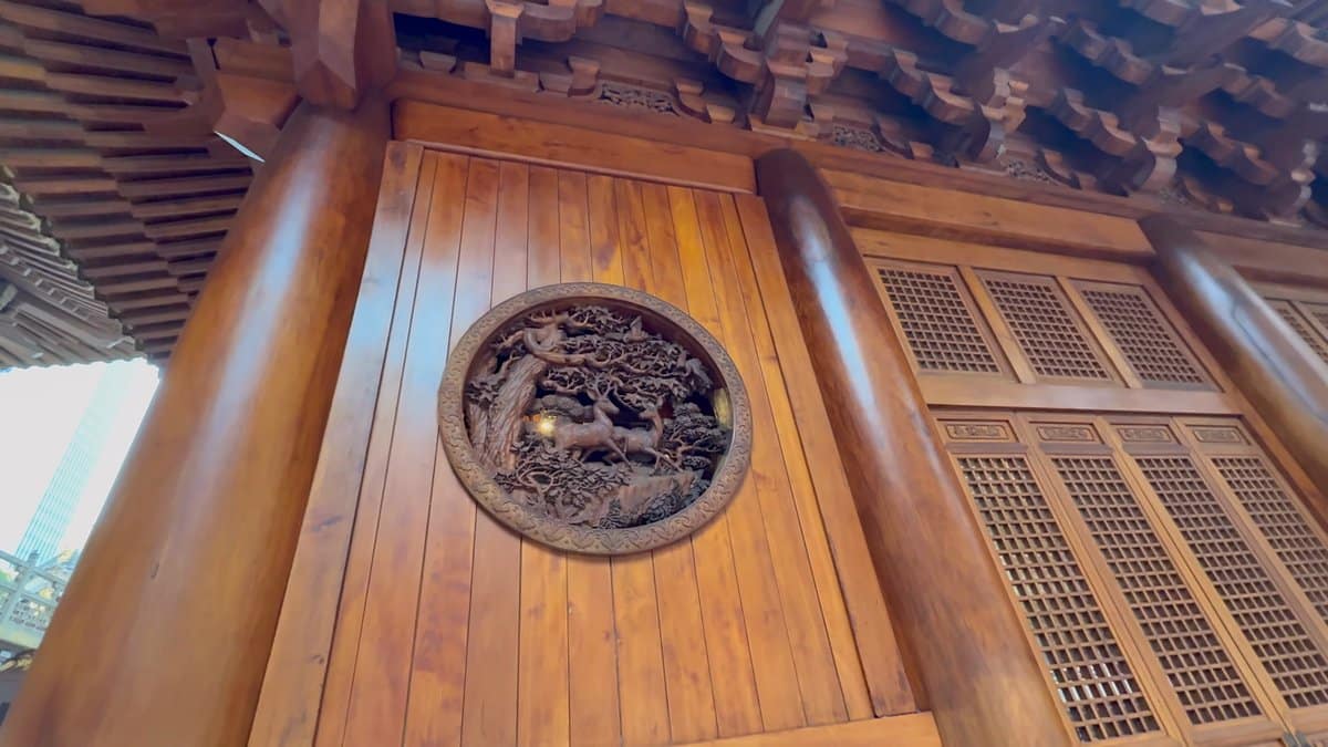 Carved timber wall medallion