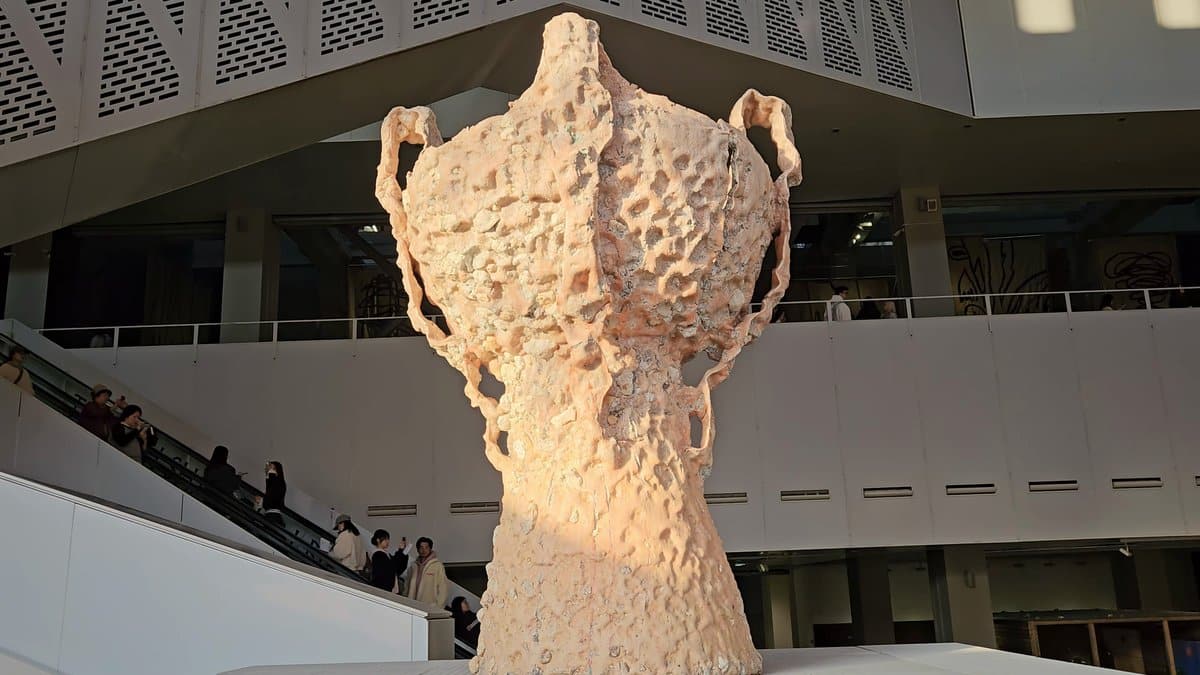 Close-up of pitted cream sculpture