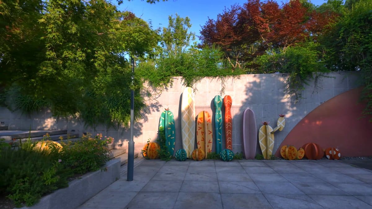 Colourful boards lining a landscaped path