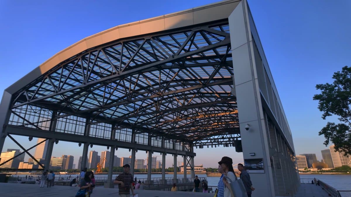 Curved steel canopy over the water