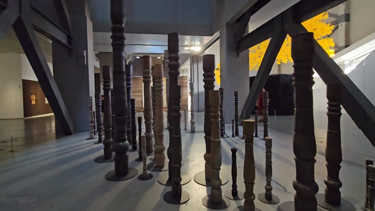 Dark timber posts standing in ranks