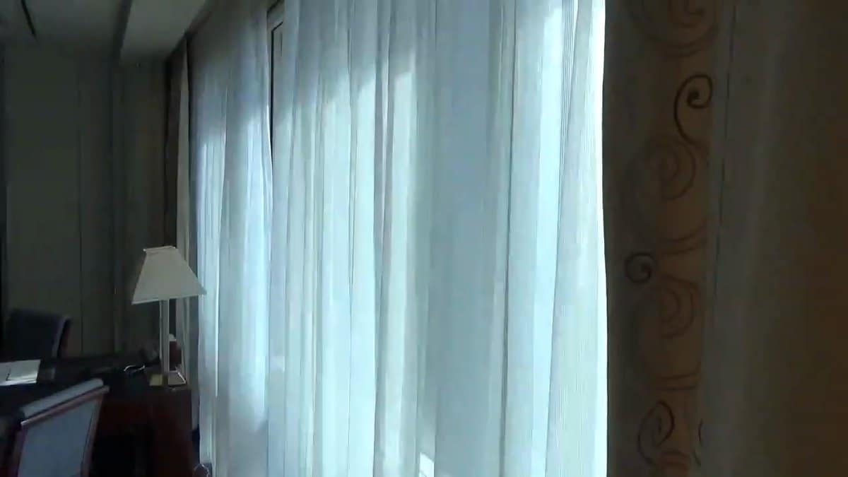 Daylit corner with sheer curtains