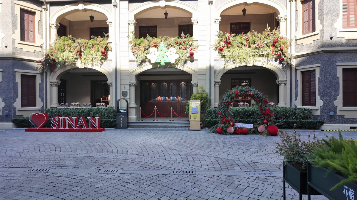 Festive courtyard with SINAN sign