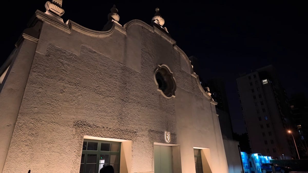 Floodlit Spanish gable of the clubhouse