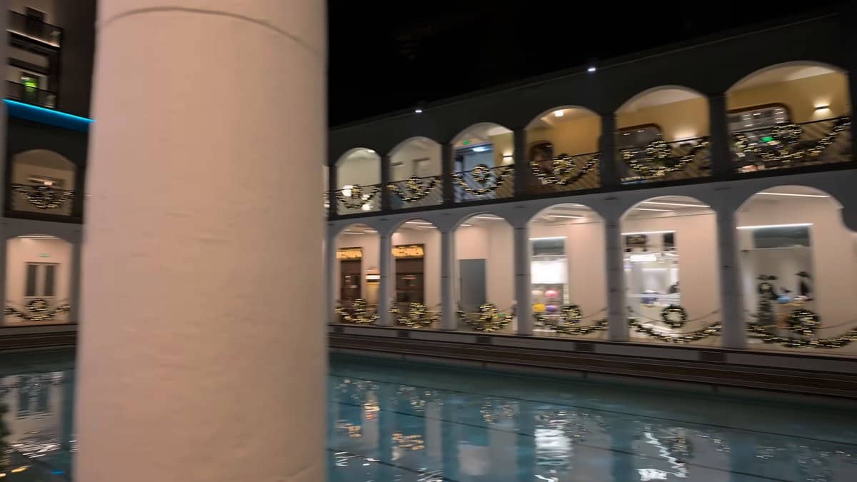 Garlanded colonnade beside the pool