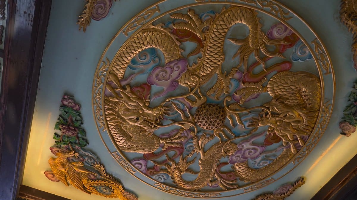 Gilt dragons chasing a flaming pearl