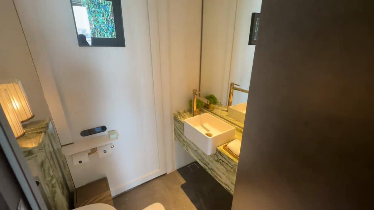 Gold tap on green marble