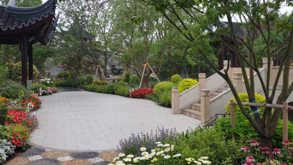 Gravel court and low stone bridge