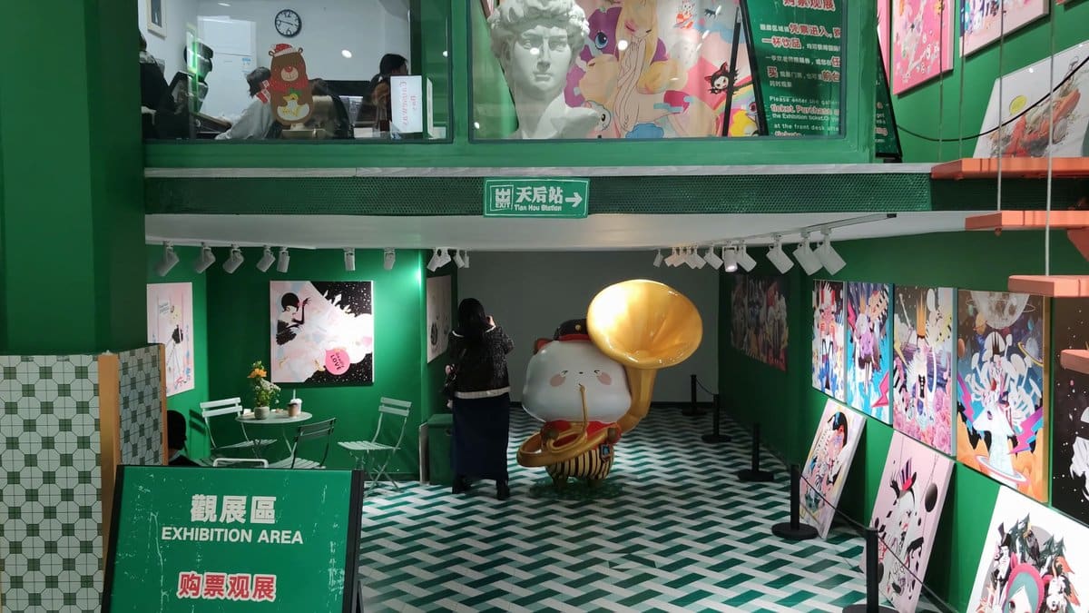 Green shop stacked with art prints