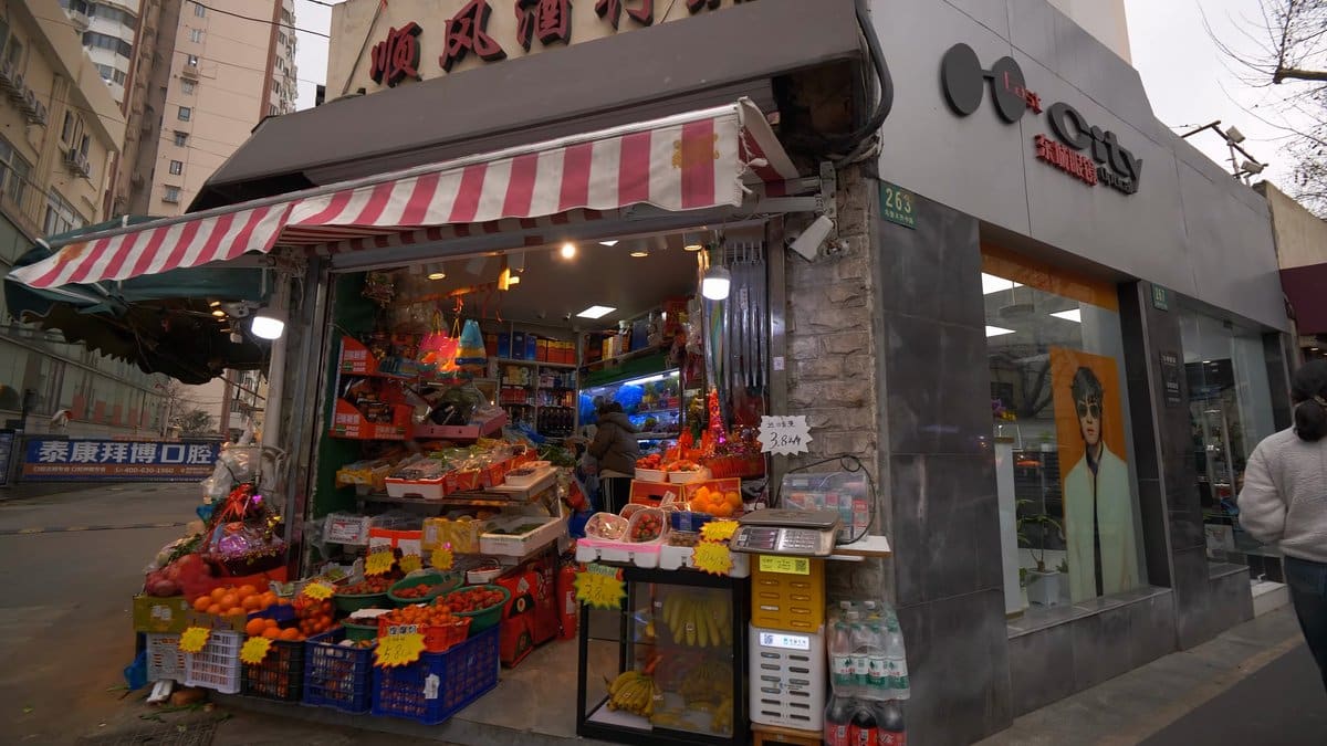 Greengrocer under striped awning