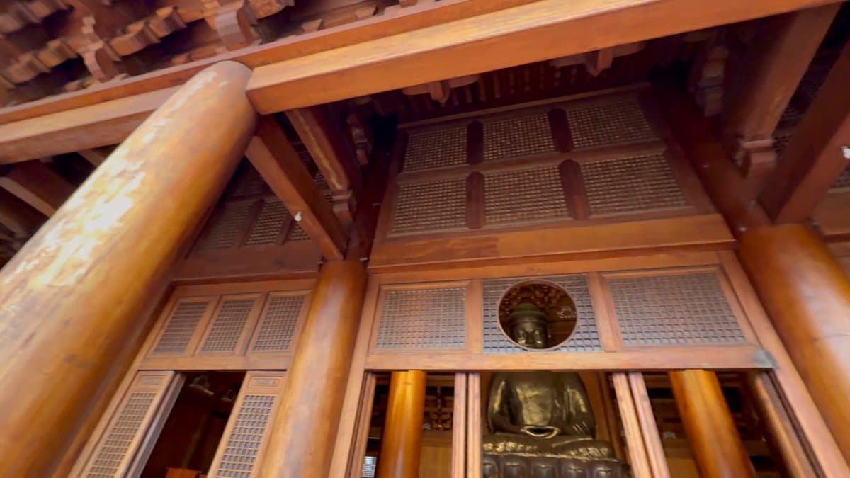 Hall ceiling and seated Buddha