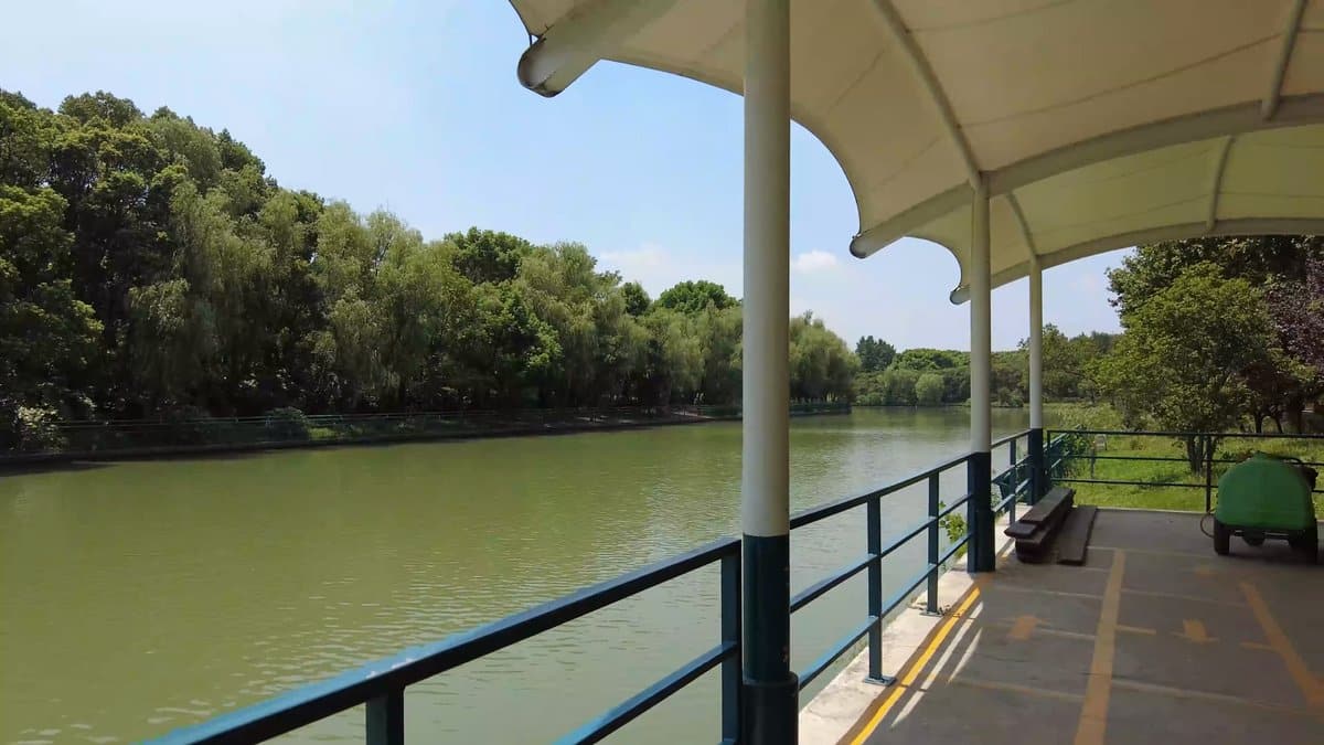 Lakeside walk under tensile canopy