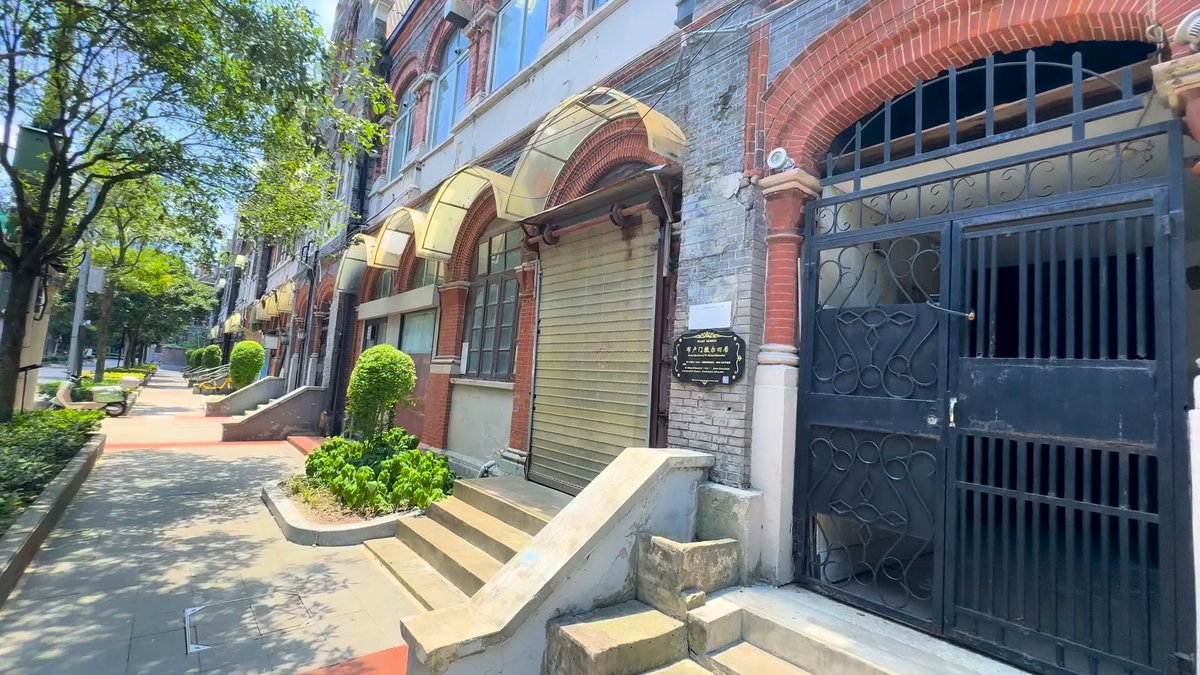 Lane between brick museum buildings