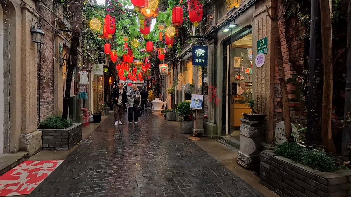 Lanterns over wet glowing lane