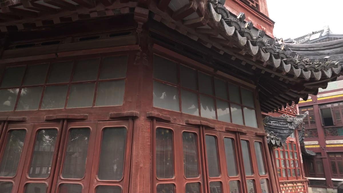 Lattice windows on timber facade