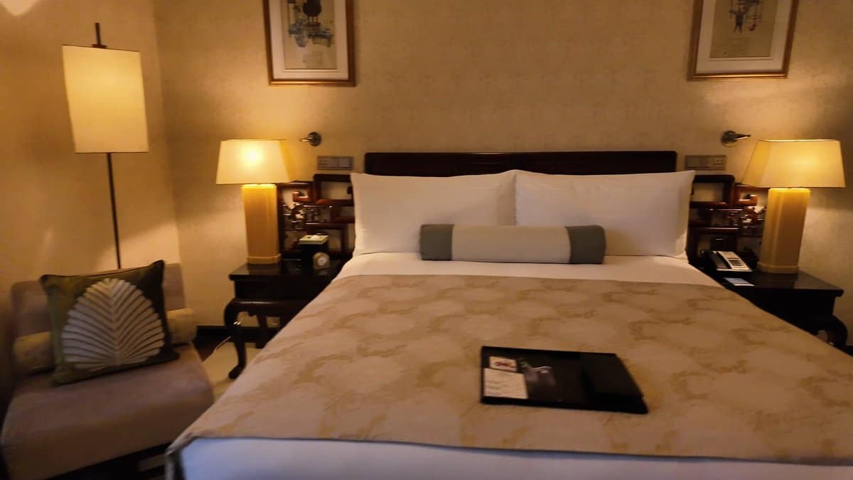 Lit lamps beside the bed