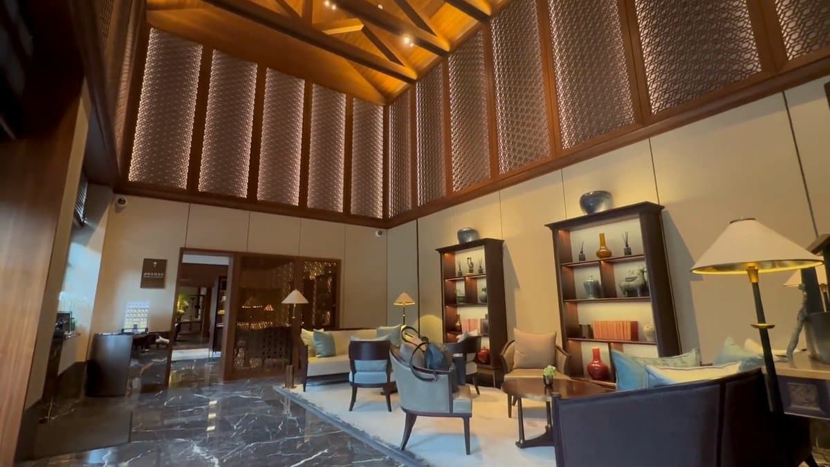 Lounge under sculptural timber ceiling