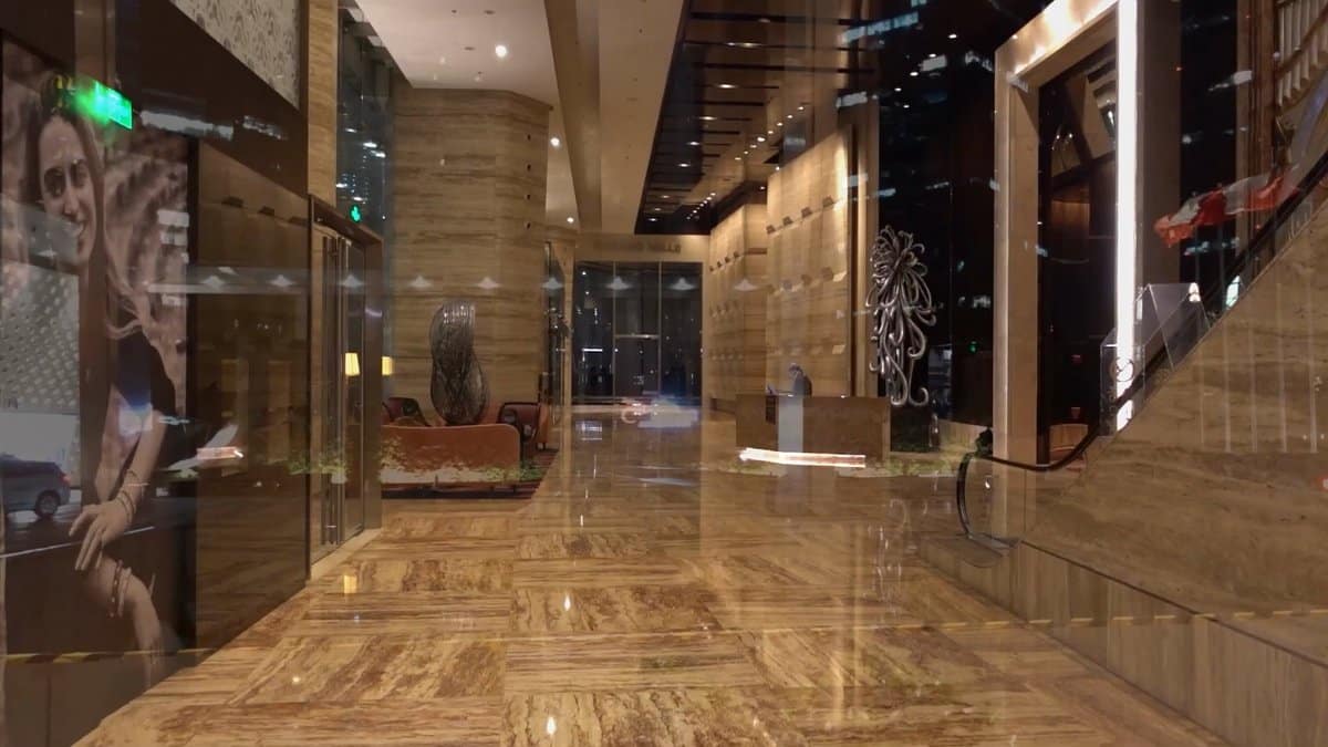 Marble lobby corridor with artwork