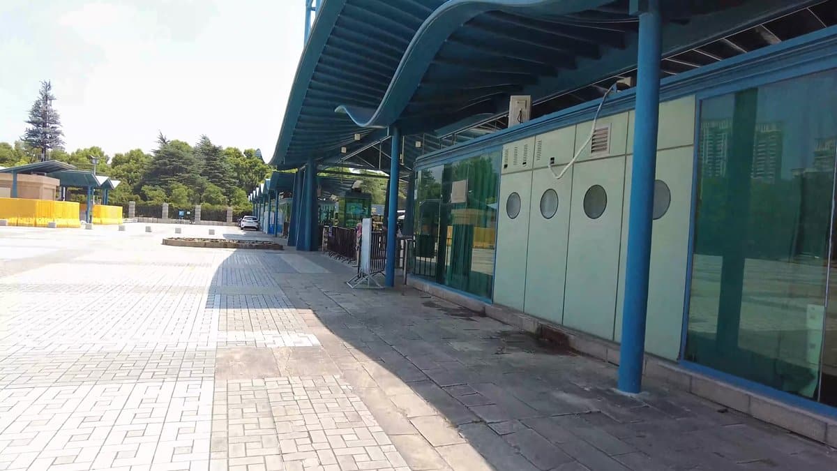 Modern gate with blue canopy