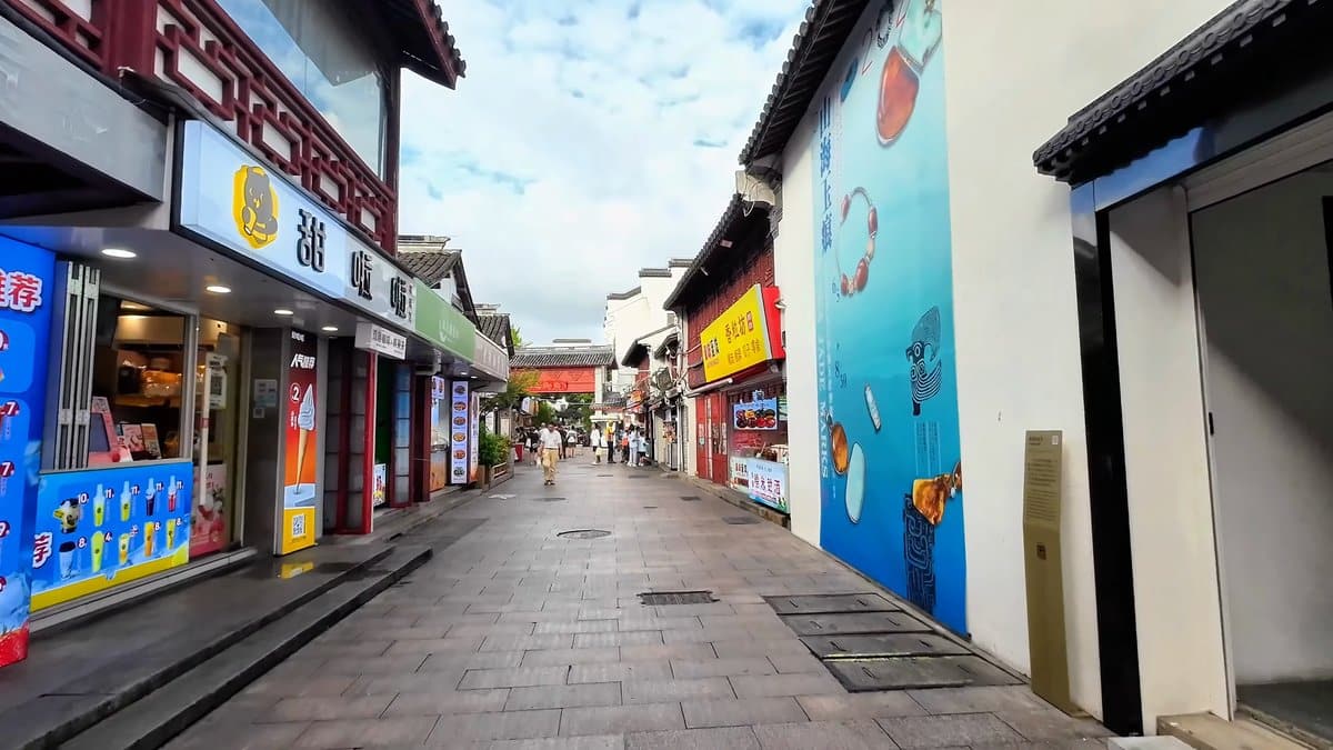 Modern shopfronts at the edge of the old