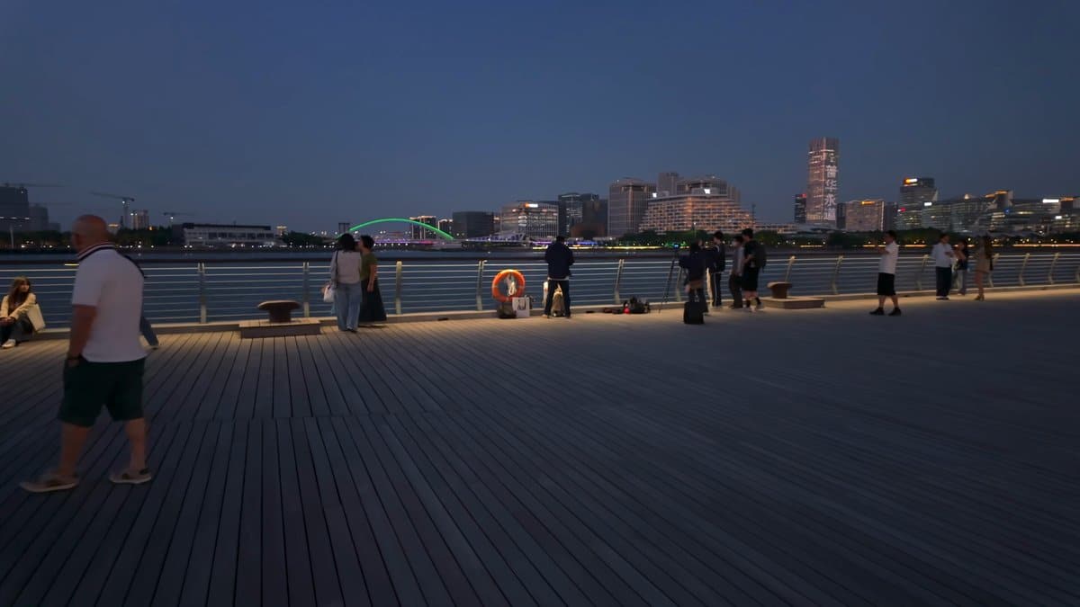Night boardwalk looking across the river