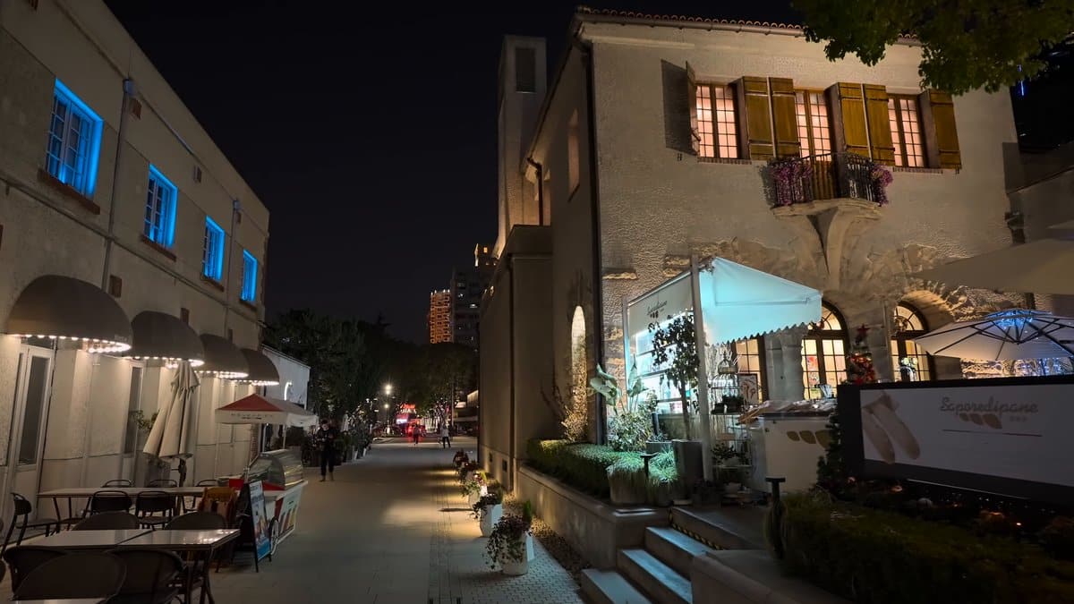 Night cafe lane and stone villa