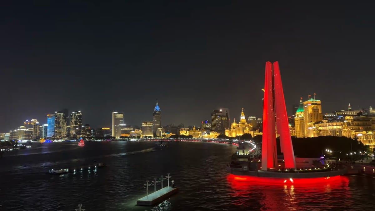 Night river and red monument