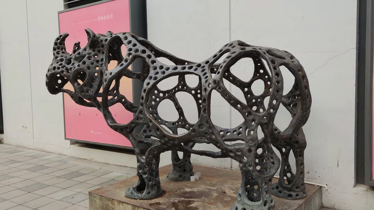 Open lattice bronze horse sculpture