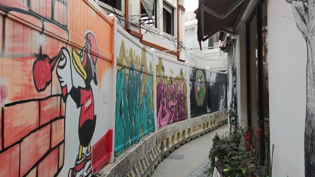 Pop-art murals covering the alley