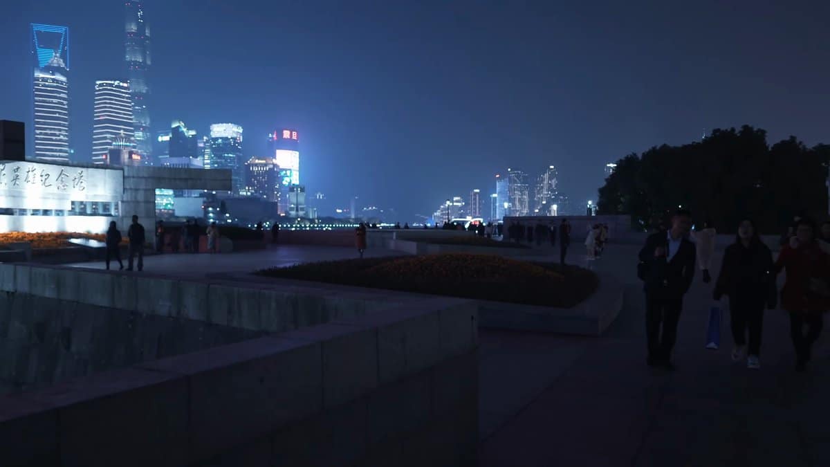Promenade beside the monument plaza — an illuminated