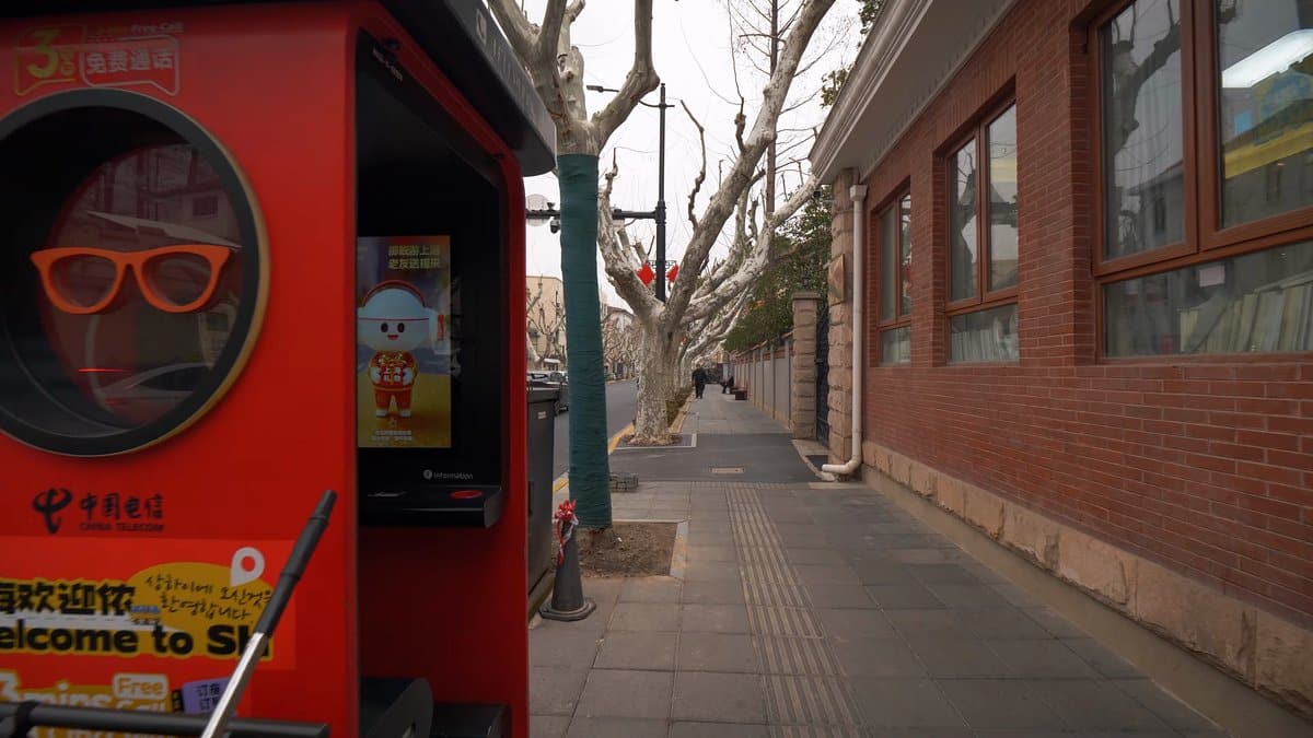 Red kiosk with circular window