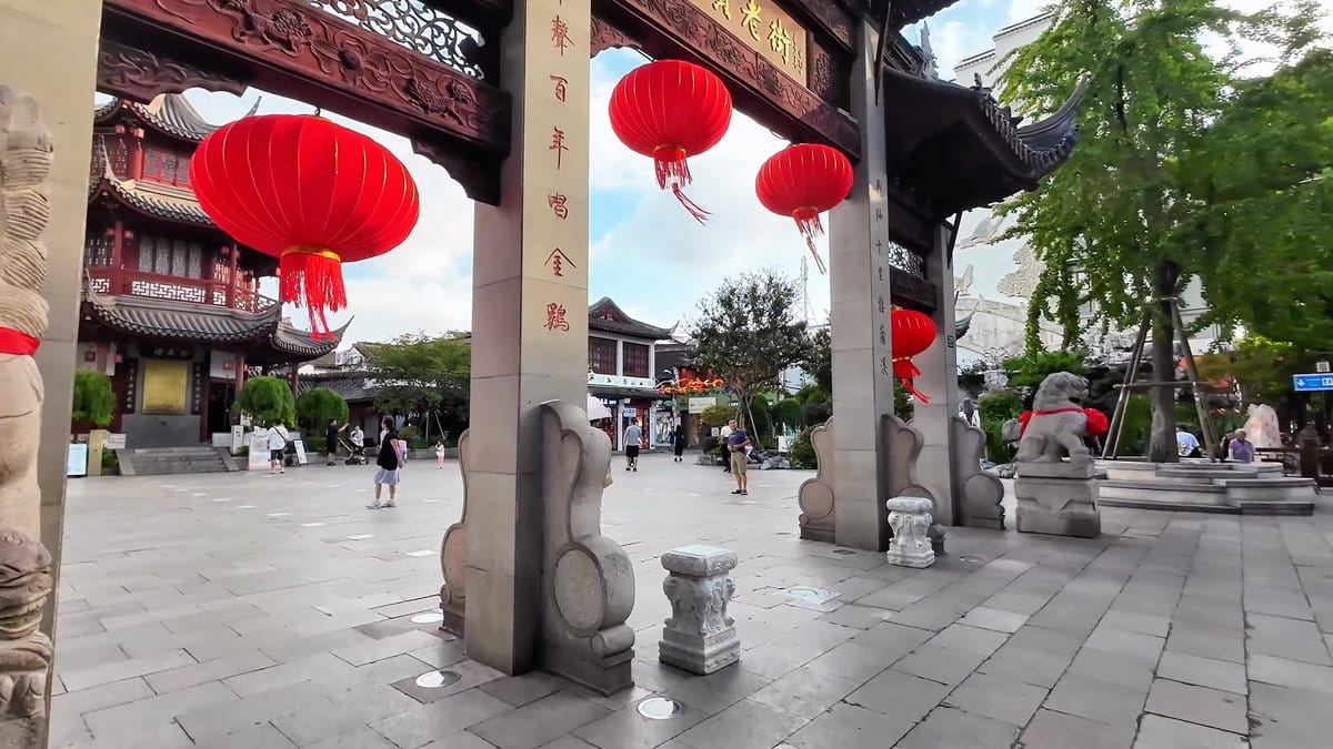 Red lanterns hanging in the archway