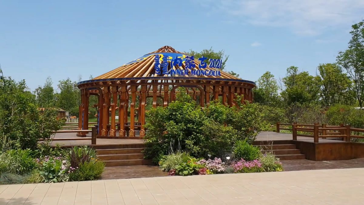 Round timber pavilion with rafter roof