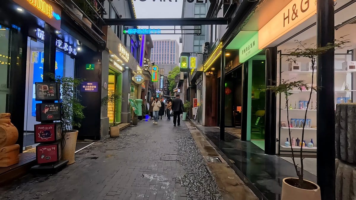 Shoppers walking past H&G shop